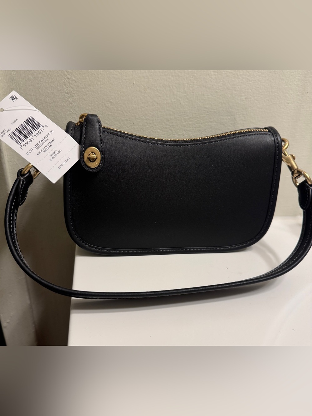 Coach Swinger Black Leather Crossbody with Gold Turnlock